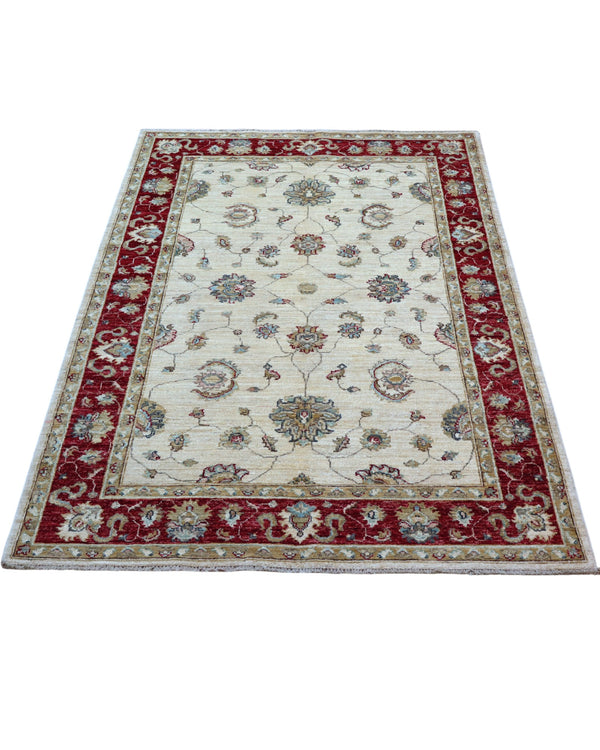 Tappeto Ziegler 175x127 cm, annodato a mano, fondo avorio con motivi floreali stilizzati e cornice rosso rubino.