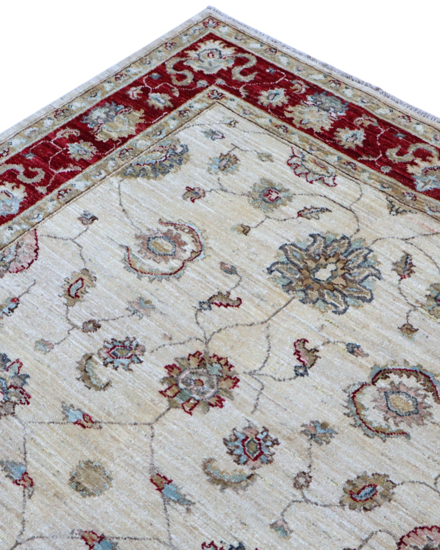 Tappeto Ziegler 175x127 cm, annodato a mano, fondo avorio con motivi floreali stilizzati e cornice rosso rubino.