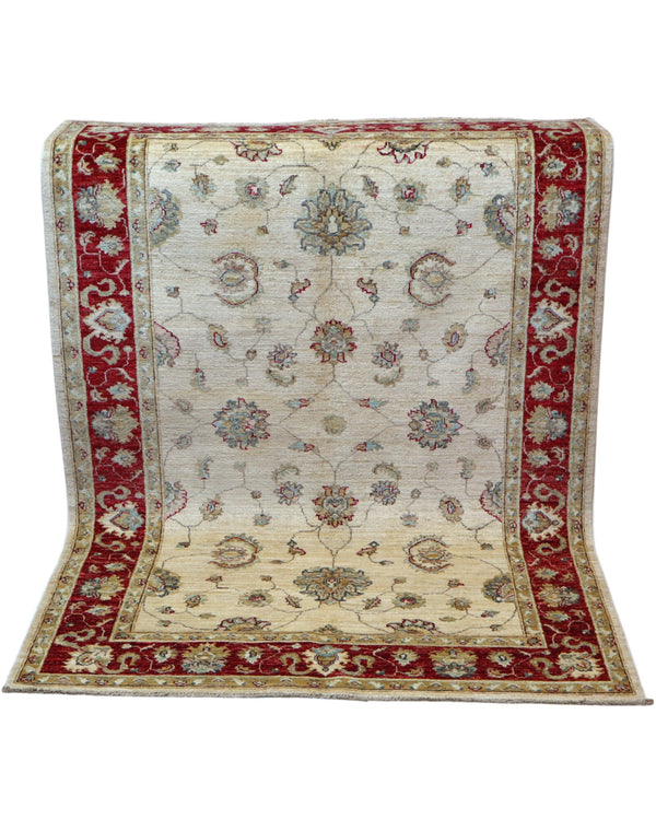 Tappeto Ziegler 175x127 cm, annodato a mano, fondo avorio con motivi floreali stilizzati e cornice rosso rubino.