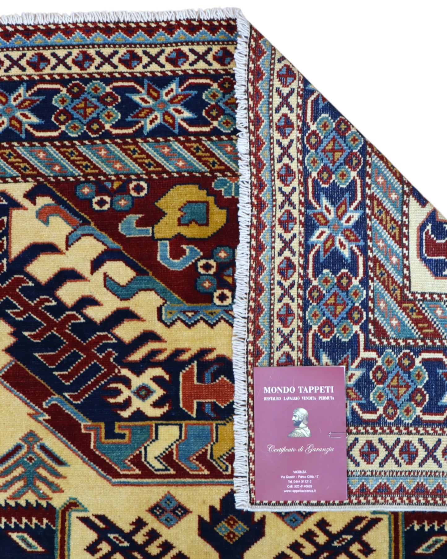 Tappeto Shirvan Afghan 164x117 cm, annodato a mano, con campo avorio, medaglione geometrico centrale e bordo decorato.