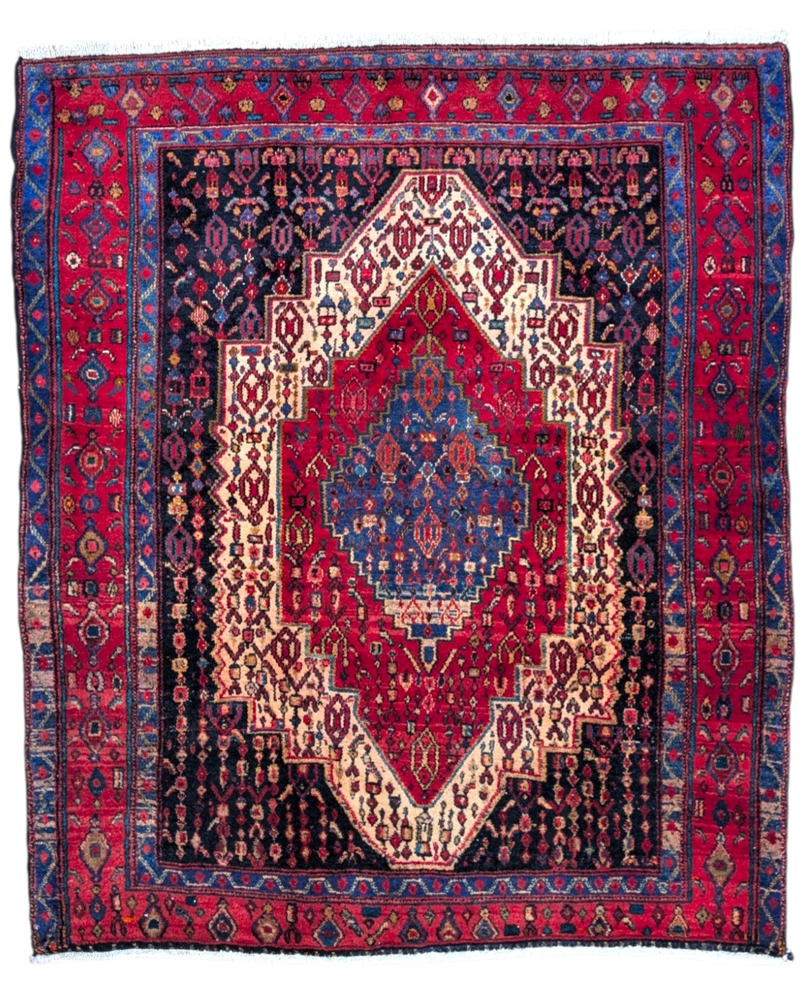 Tappeto Senneh 176x146 cm annodato a mano, con medaglione centrale blu e motivi geometrici su fondo rosso e avorio.