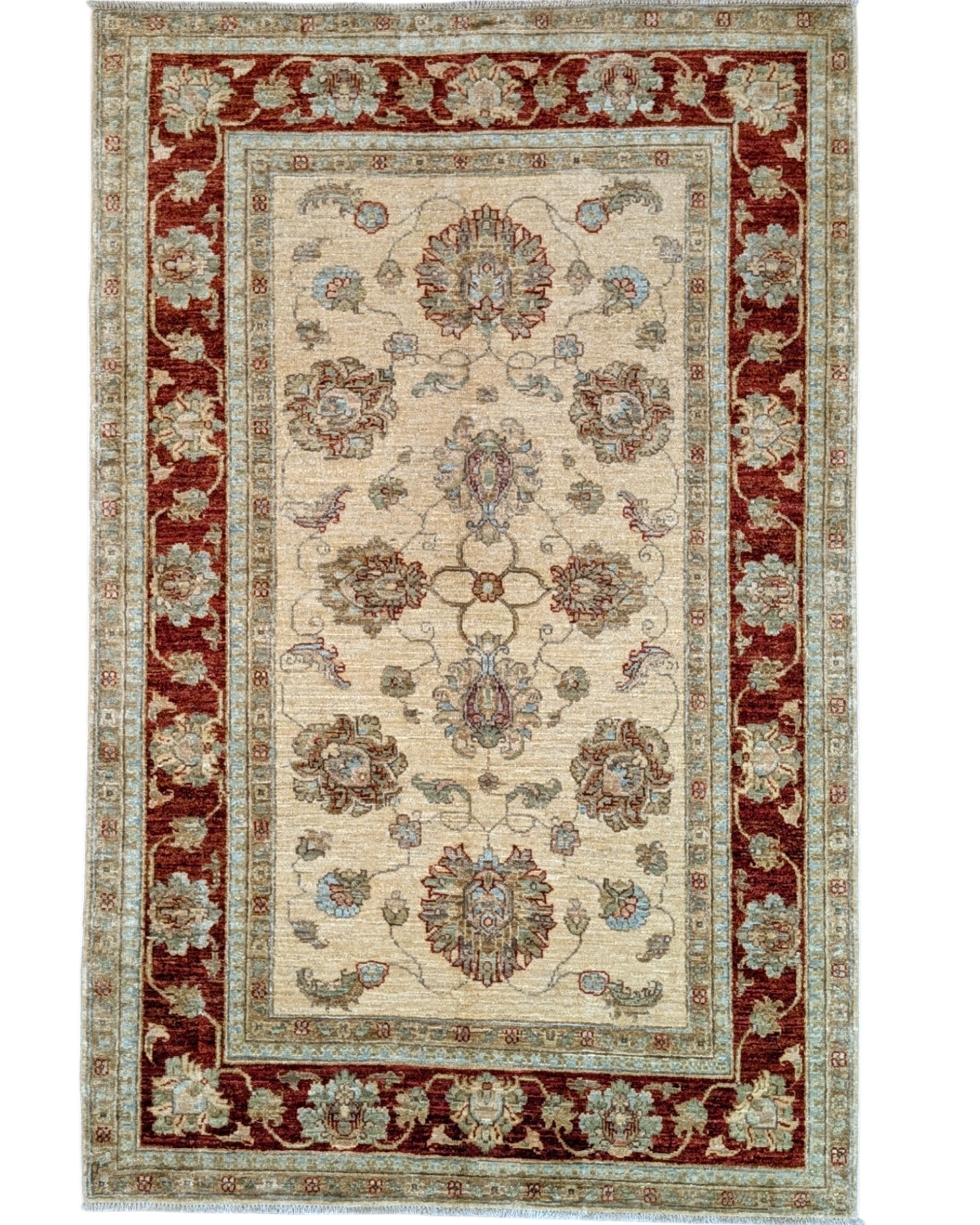 Tappeto Ziegler 184x116 cm con fondo avorio e bordura bordeaux, motivi floreali eleganti, tramato ed annodato a mano, provenienza Afghanistan.