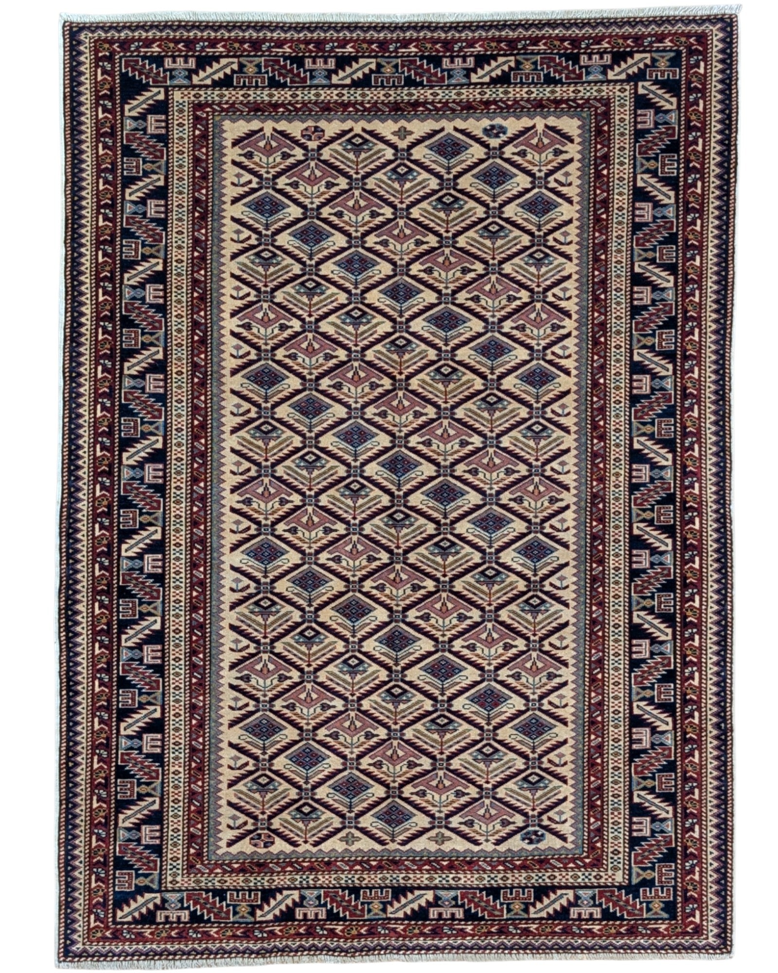 Tappeto Shirvan 167x122 cm in lana annodata a mano, fondo chiaro con rombi geometrici e cornice caucasica.