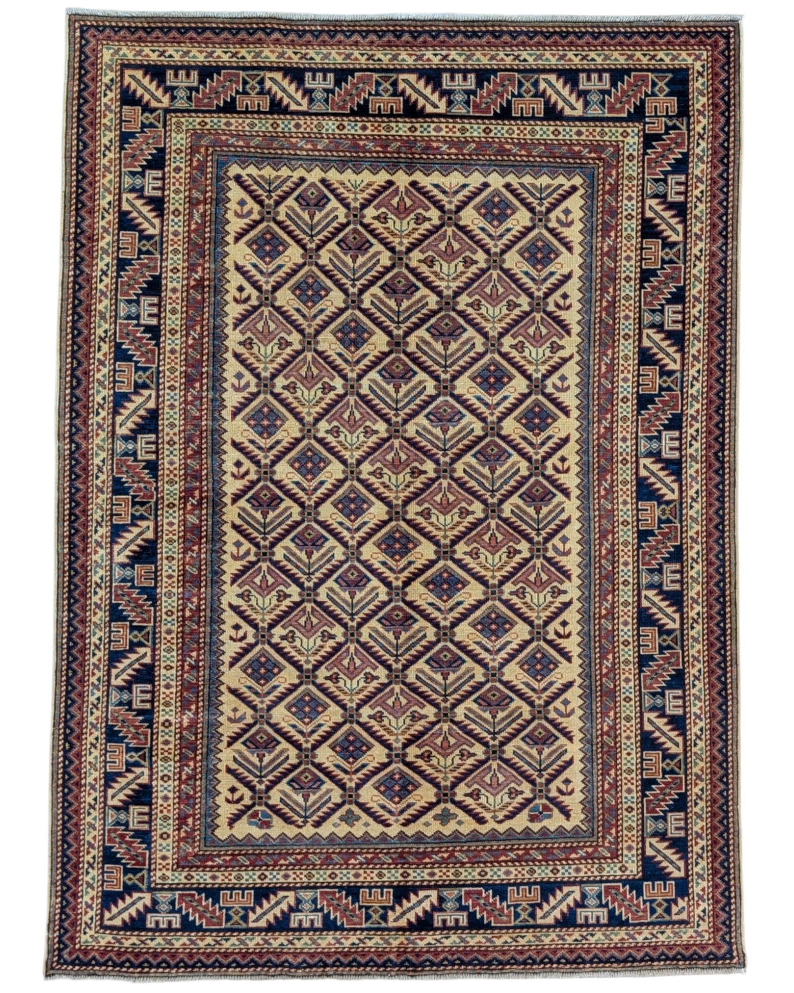 Tappeto Shirvan 166x120 cm in lana annodata a mano, fondo chiaro con rombi geometrici e cornici caucasiche.