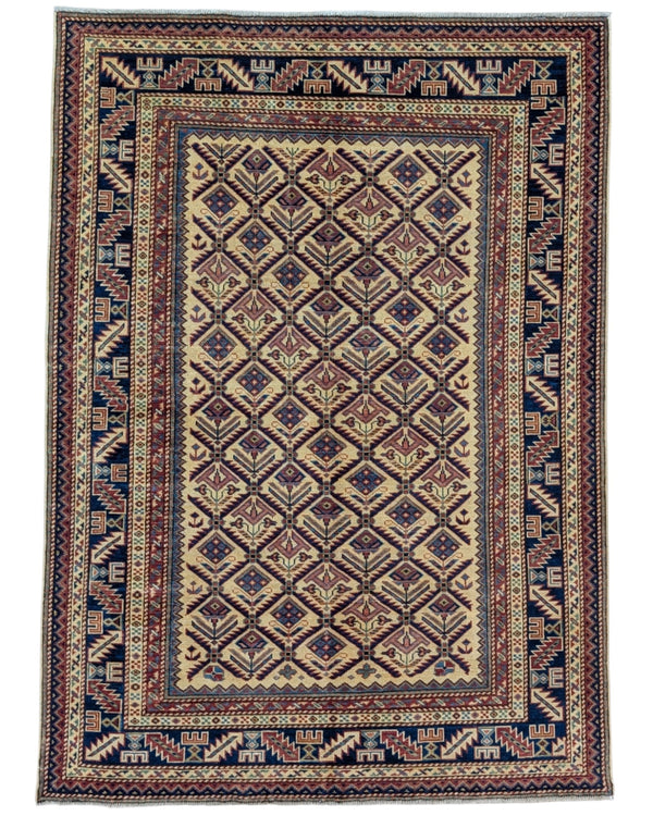 Tappeto Shirvan 166x120 cm in lana annodata a mano, fondo chiaro con rombi geometrici e cornici caucasiche.