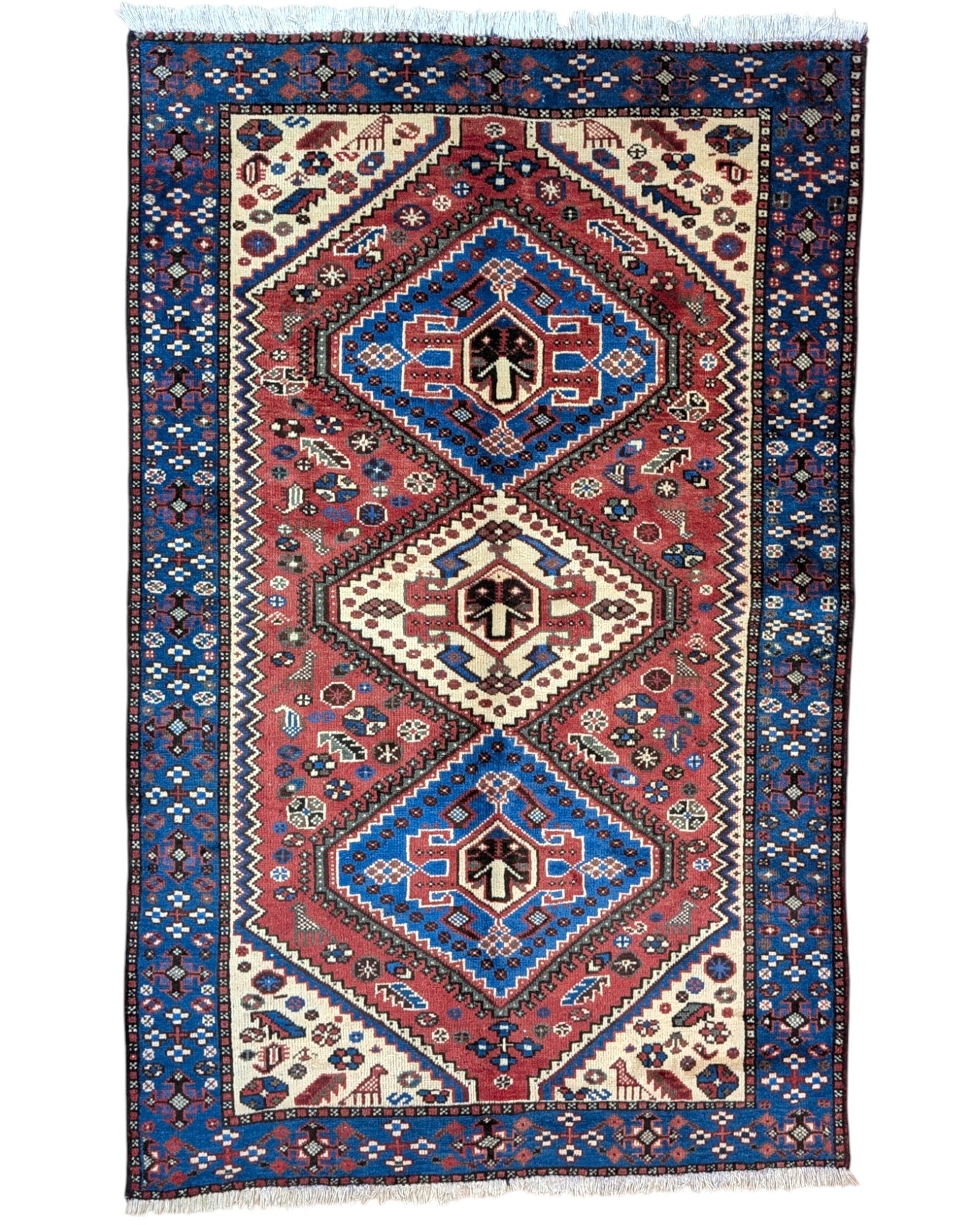 Tappeto Salame persiano 203x130 cm, annodato a mano, con tre medaglioni romboidali geometrici su fondo rosso e blu.