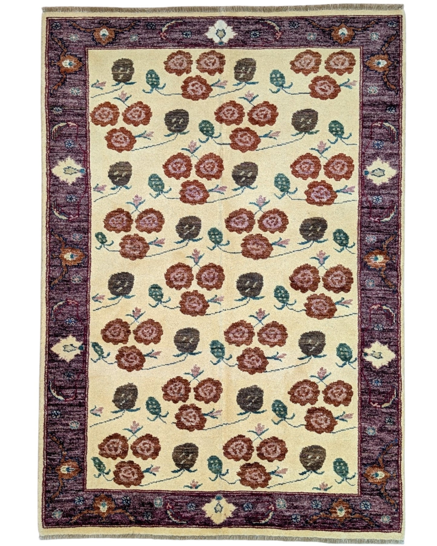 Tappeto Ziegler annodato a mano 180x126 cm con motivi floreali su fondo avorio e bordura viola.