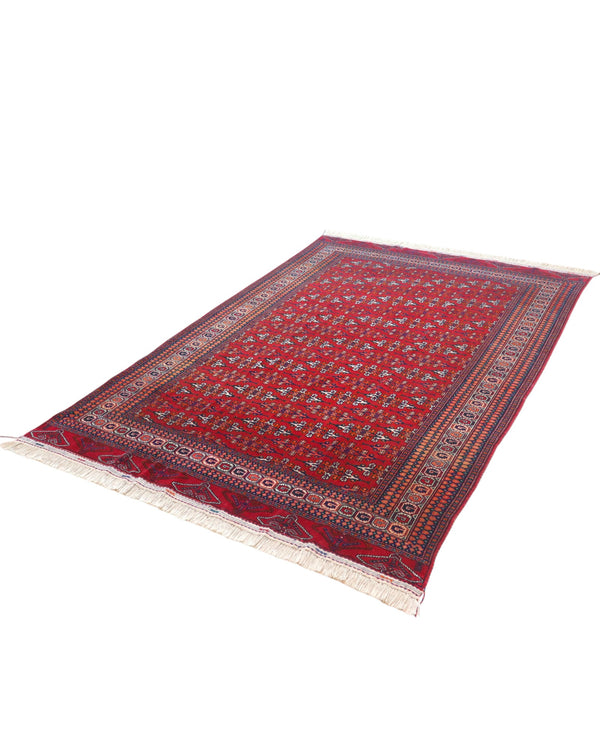 Tappeto Bokhara 280x180 cm con fondo rosso intenso e motivi geometrici blu, nero e avorio, tramato ed annodato a mano, provenienza Asia Centrale.