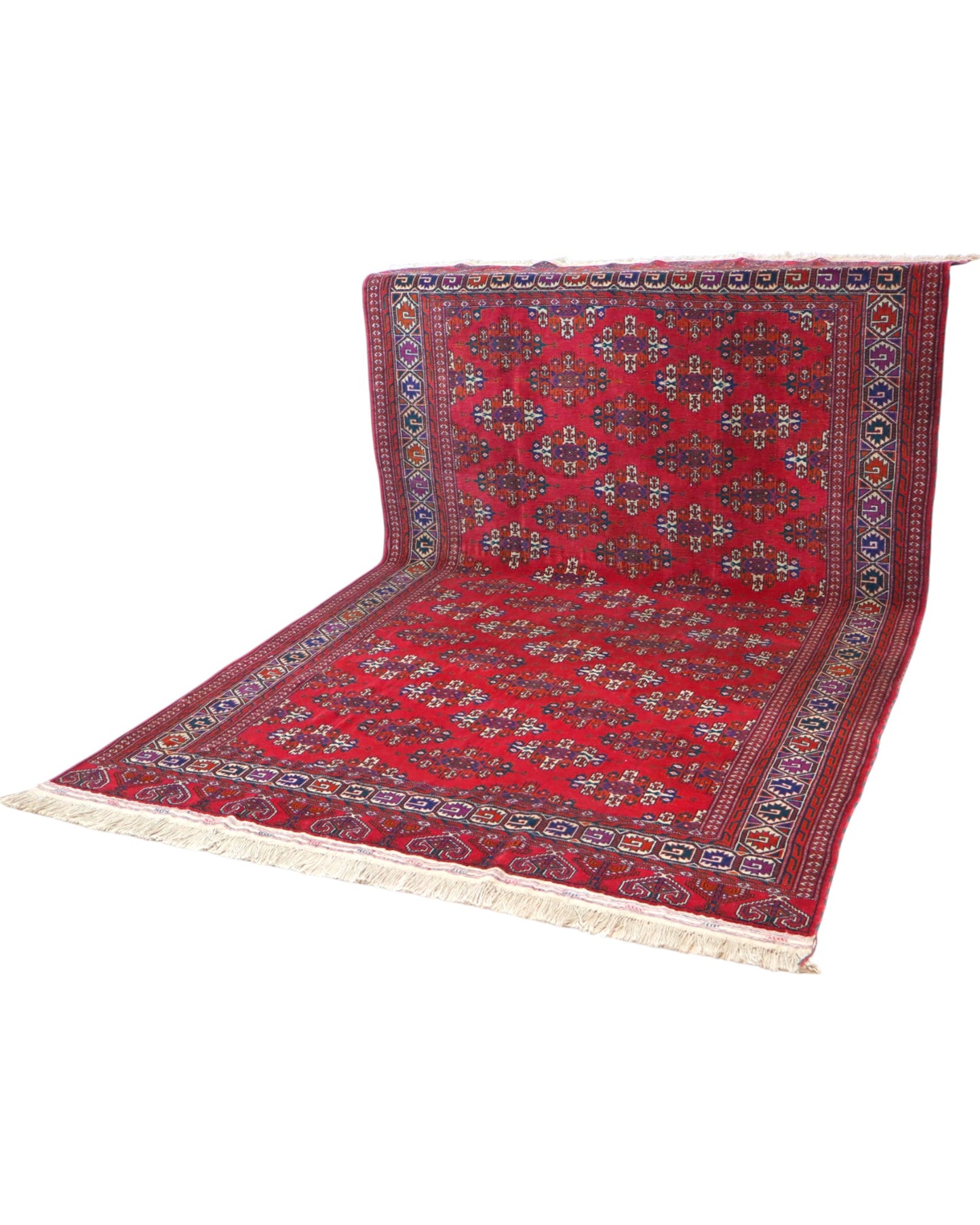 Tappeto Bukhara 280x180 cm con fondo rosso rubino e motivi geometrici ripetuti, tramato ed annodato a mano, provenienza Asia Centrale.
