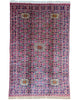 Tappeto Bukhara 300x200 cm con fondo rosa e blu, motivi geometrici e medaglioni stilizzati, tramato ed annodato a mano, provenienza Bukhara.
