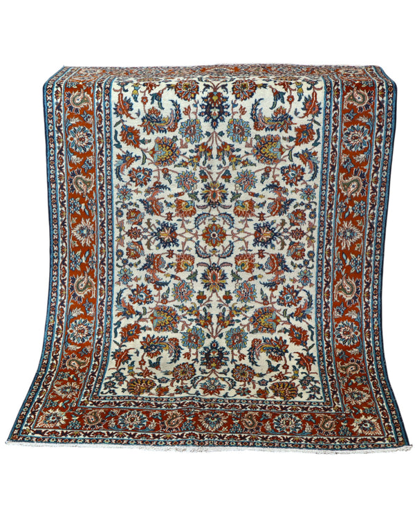 Tappeto Esfahan 182x124 cm annodato a mano, rettangolare, fondo chiaro con motivi floreali persiani, realizzato in cotone e lana con colori vegetali.