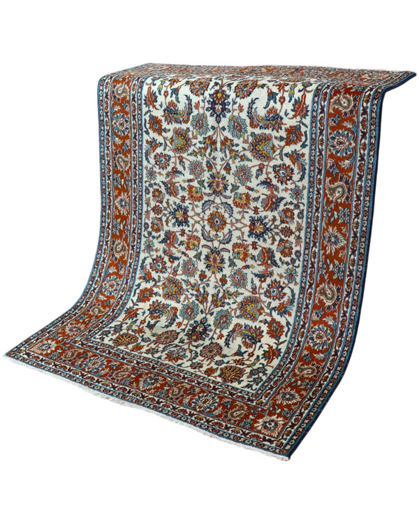 Tappeto Esfahan 182x124 cm annodato a mano, rettangolare, fondo chiaro con motivi floreali persiani, realizzato in cotone e lana con colori vegetali.