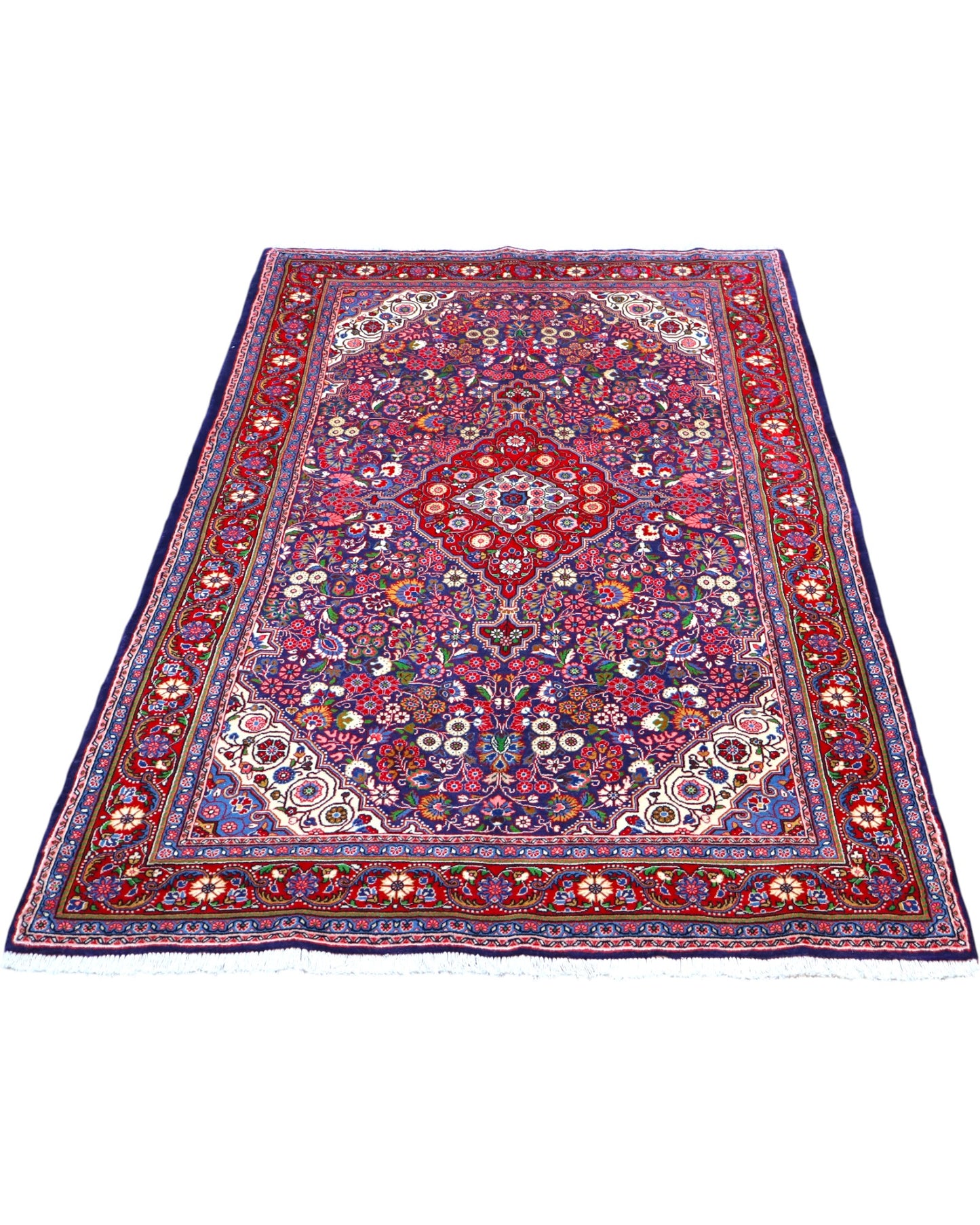 Tappeto Jozan 203x131 cm persiano, annodato a mano, fondo blu e rosso con medaglione centrale e motivi floreali ricchi di dettagli.