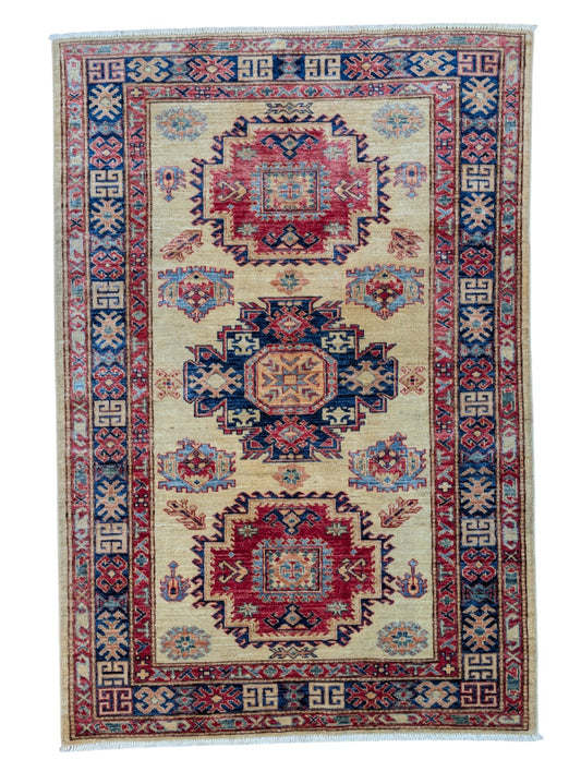 Tappeto Kazak 171x117 cm, annodato a mano in lana pregiata, motivi geometrici caucasici con medaglioni e bordura decorata.
