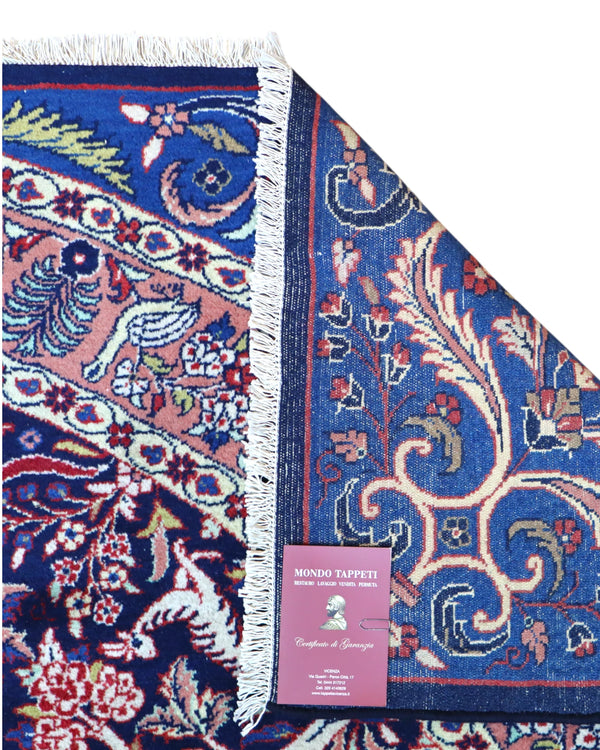 Tappeto Kerman quadrato 261x264 cm, annodato a mano in lana e cotone con colori vegetali, fondo blu con dettagli floreali e medaglione centrale persiano.