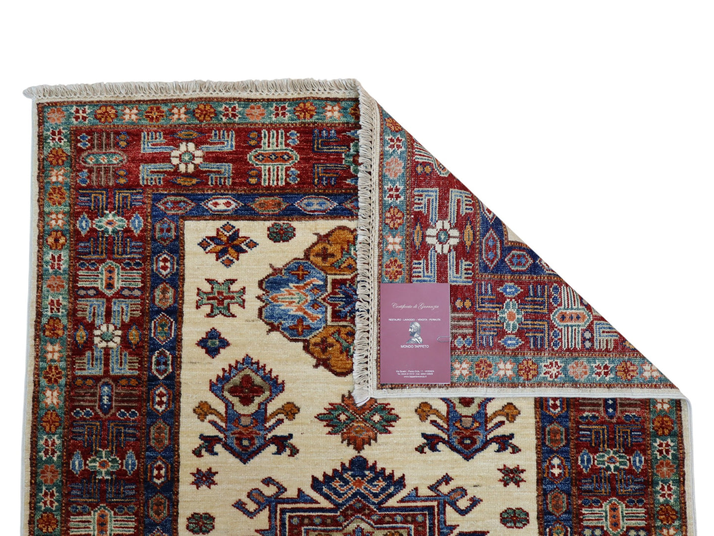 Tappeto Shirvan 145x100 cm, annodato a mano, lana pregiata con motivi geometrici e floreali caucasici.