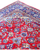 Tappeto Najafabad persiano 350x231 cm, annodato a mano in lana e cotone con colori vegetali, fondo rosso e dettagli blu e avorio.