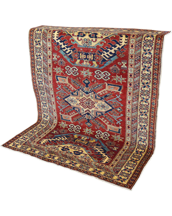 Tappeto Shirvan Afghan 163x127 cm annodato a mano, rettangolare, fondo rosso con motivi geometrici, realizzato in cotone e lana con colori vegetali.