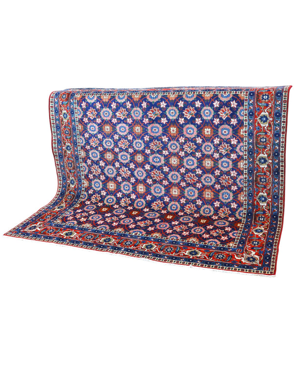 Tappeto Varamin 201x193 cm persiano annodato a mano, quasi quadrato, fondo blu con disegno floreale Mina Khani in rosa, avorio e azzurro, cornice rossa decorata.