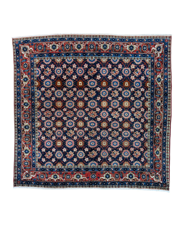 Tappeto Varamin 201x193 cm persiano annodato a mano, quasi quadrato, fondo blu con disegno floreale Mina Khani in rosa, avorio e azzurro, cornice rossa decorata.