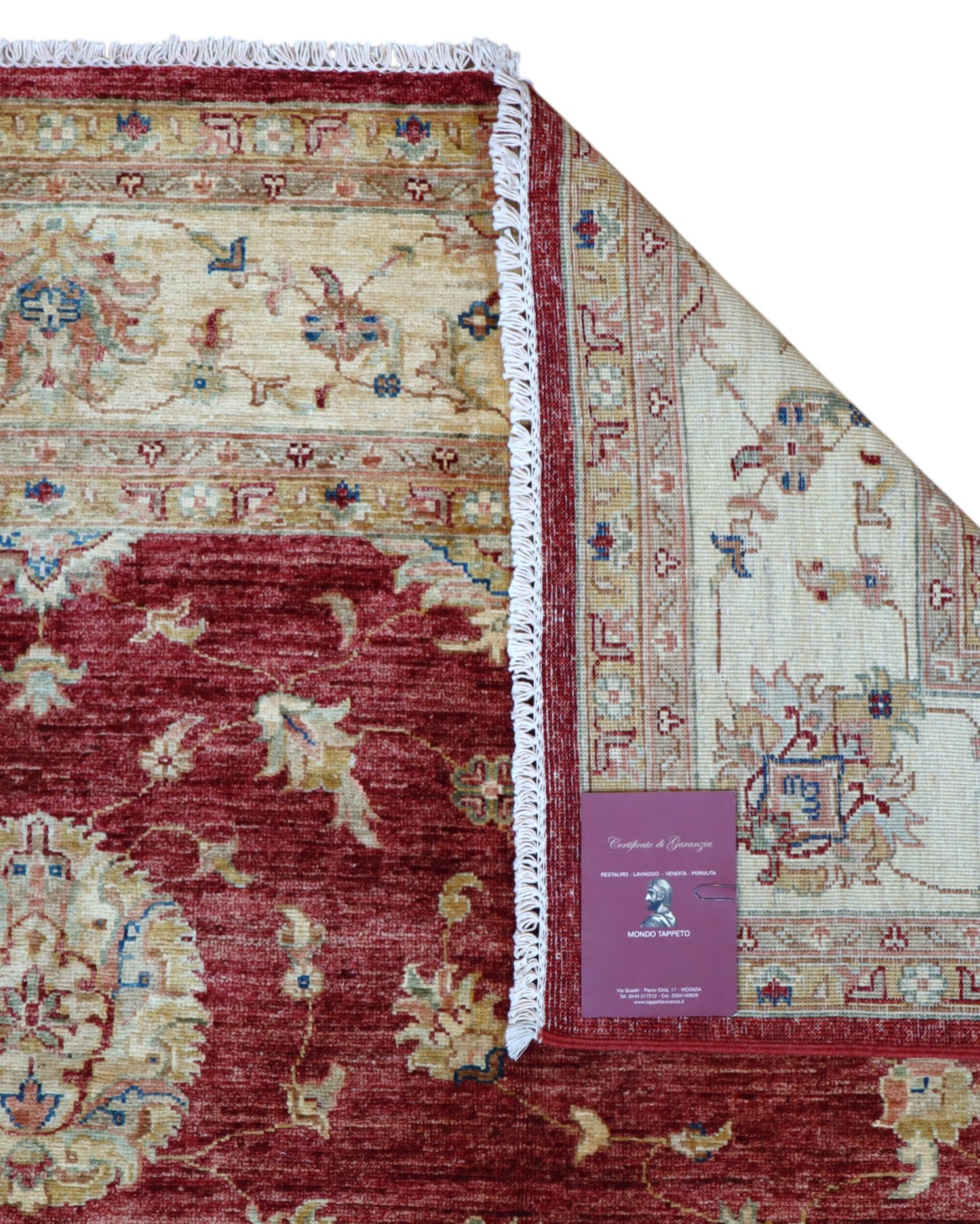 Tappeto Ziegler 298x207 cm con fondo bordeaux, motivi floreali avorio e dettagli azzurri, tramato ed annodato a mano, provenienza Afghanistan.
