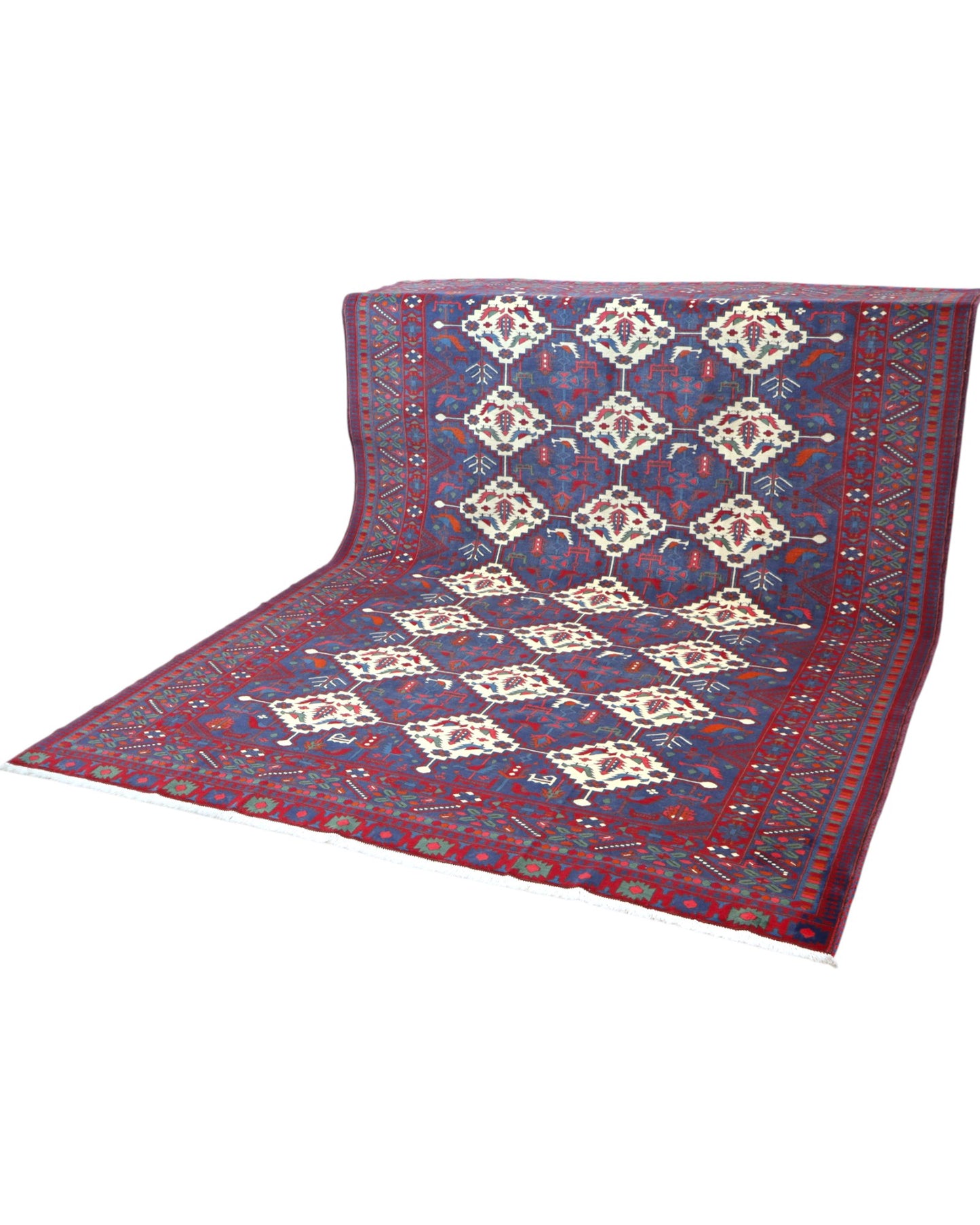 Tappeto afgano 289x196 cm con fondo blu e motivi geometrici avorio e rossi, tramato ed annodato a mano, provenienza Afghanistan.