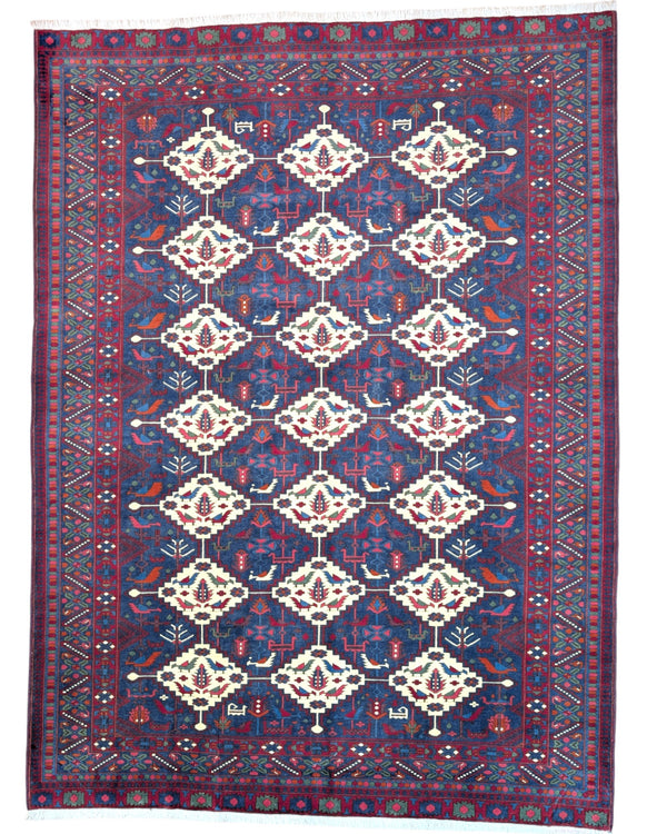 Tappeto afgano 289x196 cm, tramato ed annodato a mano, fondo blu con motivi geometrici in avorio e rosso. Eleganza e tradizione artigianale.