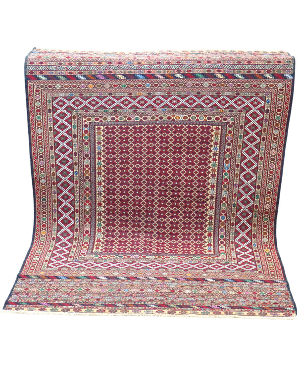 Tappeto Sumakh 184x126 cm con fondo bordeaux e motivi geometrici multicolori, annodato a mano, tradizione caucasica.