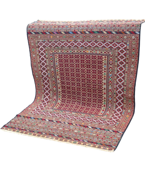 Tappeto Sumakh 184x126 cm con fondo bordeaux e motivi geometrici multicolori, annodato a mano, tradizione caucasica.