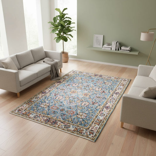 Tappeto Kilim Turco 290x200 cm con fondo azzurro, motivi floreali e geometrici multicolori, tramato ed annodato a mano.