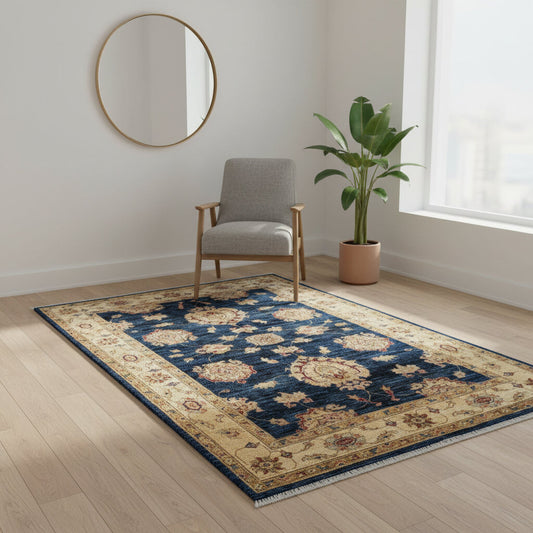 Tappeto Ziegler 178x122 cm con motivo floreale su fondo blu scuro e bordura beige, ideale per arredamenti eleganti.