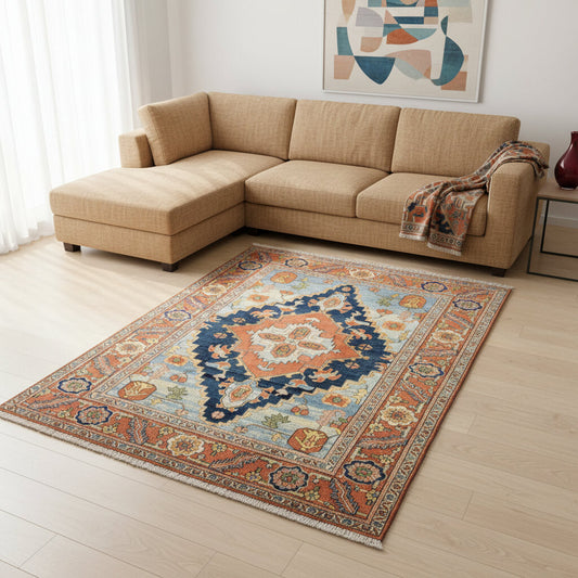 "Tappeto Heriz tradizionale con medaglione geometrico in azzurro, blu e terracotta, annodato a mano, 288x210 cm."
