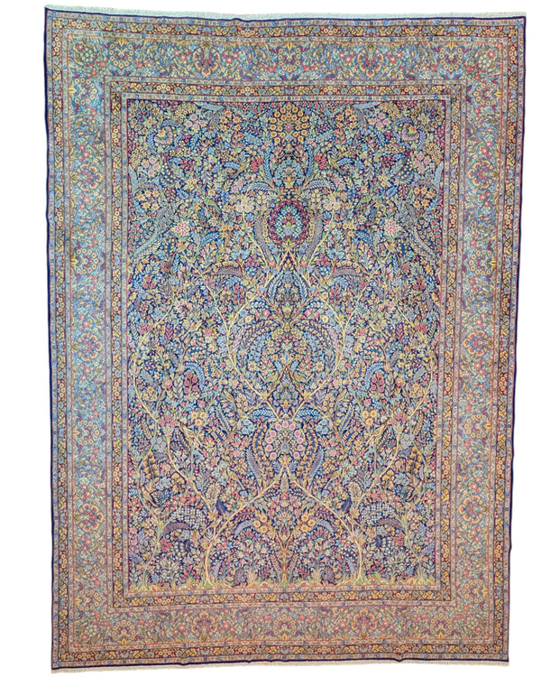 Tappeto Tabriz 486x357 cm persiano, annodato a mano in lana pregiata con colori vegetali, ricco motivo floreale su fondo azzurro e blu. Eleganza maestosa.