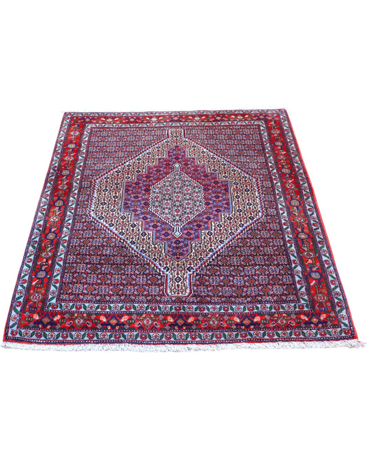 Tappeto Sanneh multicolore 154x127 cm con disegno geometrico in salotto