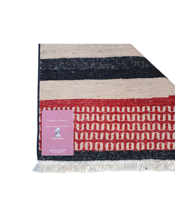 Tappeto moderno 300x200 cm Persia con design astratto rosso, nero, beige, giallo e azzurro, annodato a mano in lana naturale.