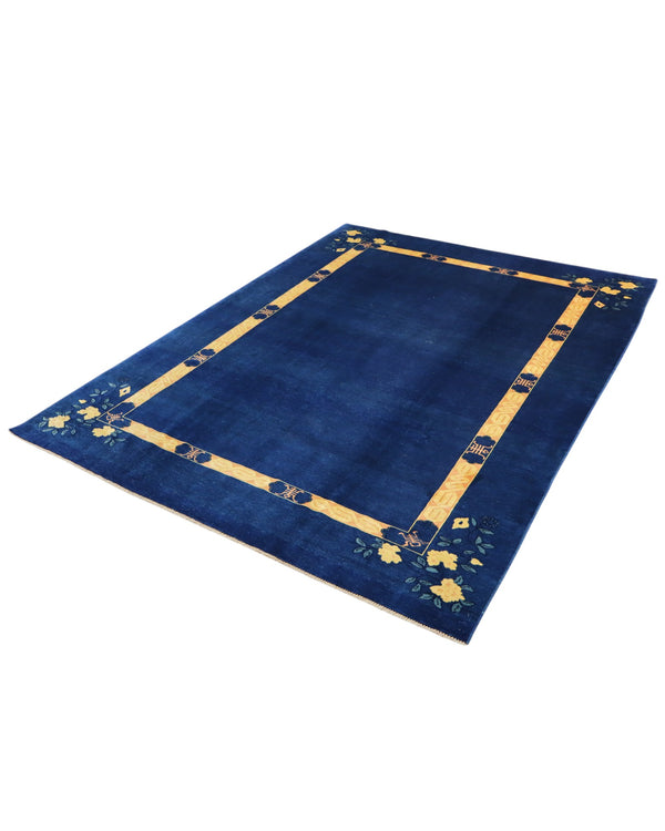 Tappeto moderno 284x213 cm Persia con fondo blu e cornice gialla decorata da fiori stilizzati, annodato a mano in lana naturale.
