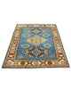 Tappeto Kazak celeste con cornice beige e motivi geometrici, annodato a mano in Afghanistan in lana e cotone con colori vegetali.