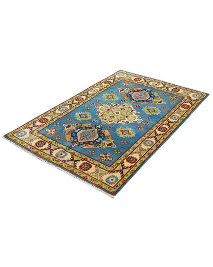 Tappeto Kazak celeste con cornice beige e motivi geometrici, annodato a mano in Afghanistan in lana e cotone con colori vegetali.