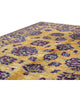 Tappeto Farahan Ziegler oro e blu notte, annodato a mano in Afghanistan. Realizzato in lana e cotone con colori vegetali, unisce eleganza floreale e tradizione artigianale.