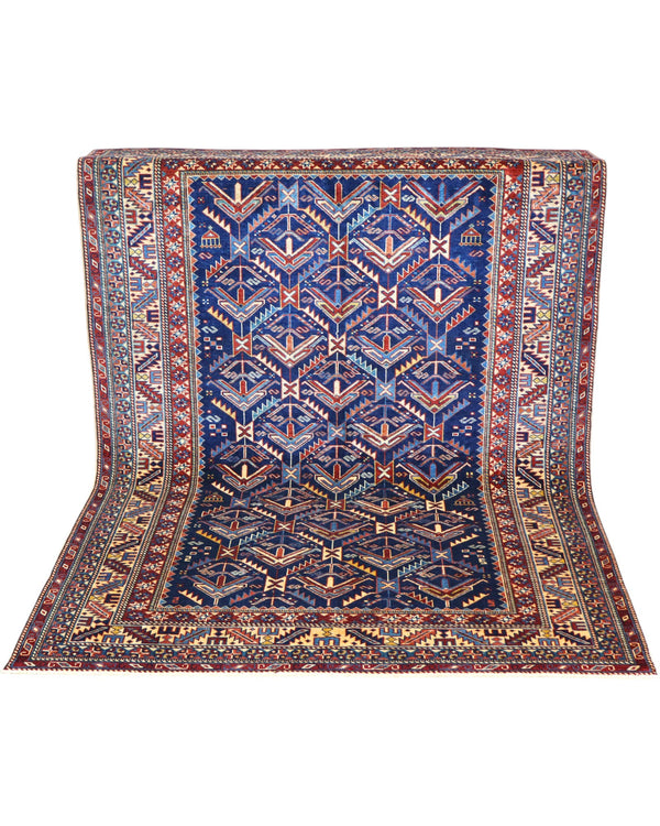 Tappeto Shirvan rettangolare 198x150 cm, fondo blu con cornice beige e motivo geometrico, annodato a mano in lana con colori vegetali, provenienza Afghanistan.