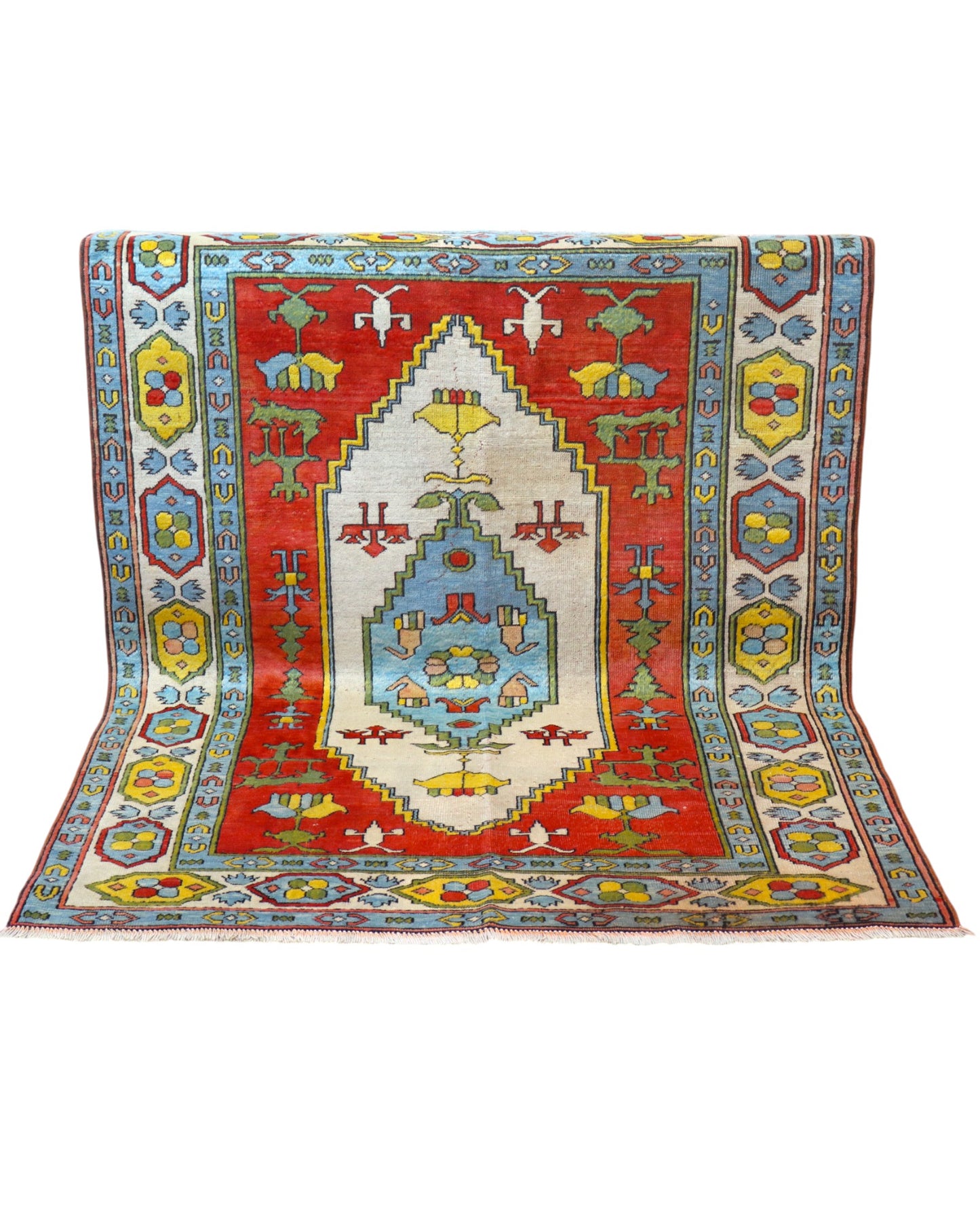 Tappeto Caucaso rosso con motivi geometrici tradizionali, annodato a mano in Turchia in pura lana tinta con colori vegetali.