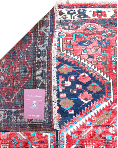 Tappeto Hamedan "Giardino Persiano" rosso melograno con motivi geometrici e floreali, annodato a mano in Persia.