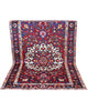 Tappeto Bakhtiyari annodato a mano, 214 x 149 cm, fondo rosso vinaccia con motivi decorativi raffinati.