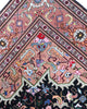 Tappeto Tabriz 60 Raj 202x136 cm – tappeto persiano annodato a mano in lana e seta, con fondo nero e cornice beige.