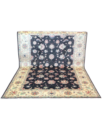 Tappeto Ziegler afgano, fondo nero con cornice beige e disegno decorativo, annodato a mano, 262x180 cm.