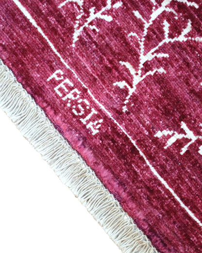 Tappeto moderno 225x178 cm Persia con fondo bordeaux e motivi floreali in avorio, annodato a mano in lana e cotone.