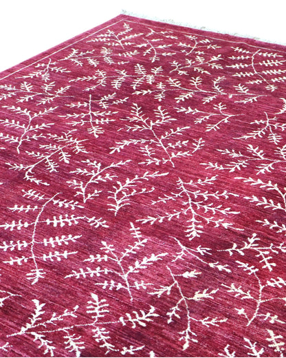 Tappeto moderno 225x178 cm Persia con fondo bordeaux e motivi floreali in avorio, annodato a mano in lana e cotone.