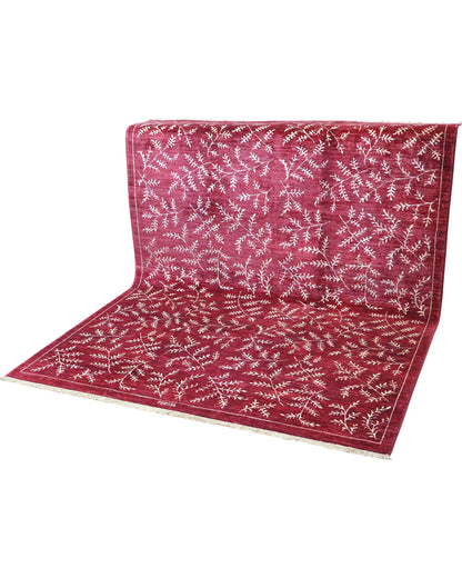 Tappeto moderno 225x178 cm Persia con fondo bordeaux e motivi floreali in avorio, annodato a mano in lana e cotone.