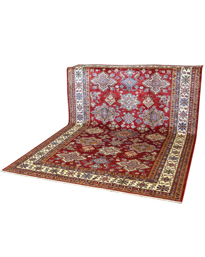 Tappeto Shirvan 295x207 cm con fondo bordeaux, motivi geometrici e floreali in avorio, blu e giallo, tramato ed annodato a mano, provenienza Caucaso.