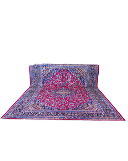 Tappeto persiano Mashhad 408x300 cm, fondo rosso con medaglione centrale e cornice floreale blu e oro, annodato a mano in lana vegetale.